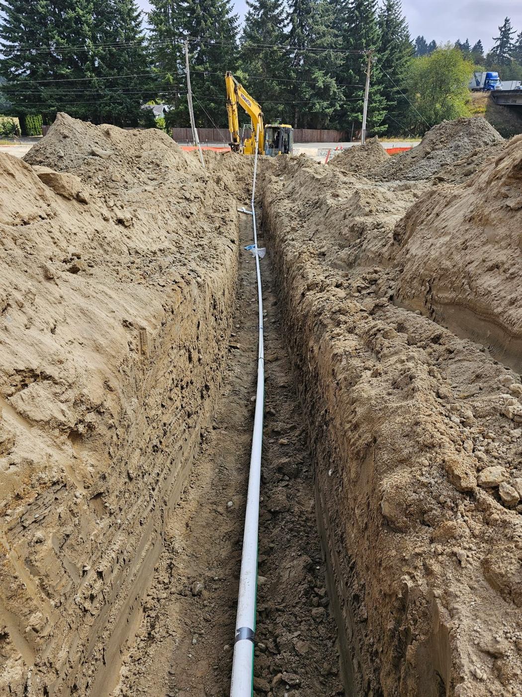 Utility pipe laid in an open trench